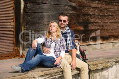 Woman resting and leaning on man's shoulder