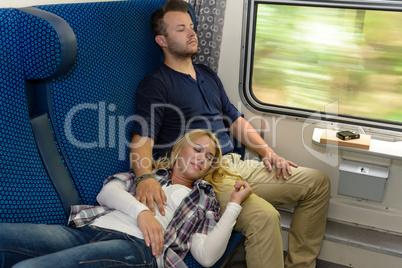 Couple sleeping in train woman man vacation