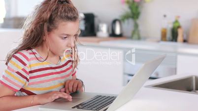 Child using a laptop