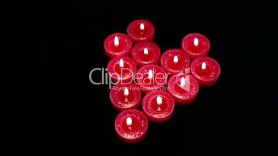 Red candles putting out because of a gale