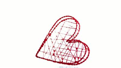 Red heart shaped box falling