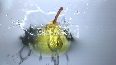 Pear falling in water