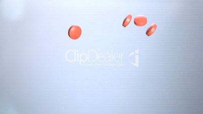 Pills dropping in water