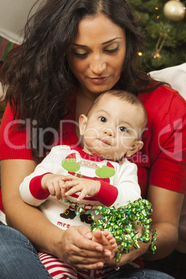 Ethnic Woman With Her Mixed Race Baby Christmas Portrait