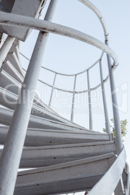 White iron steps of spiral staircase