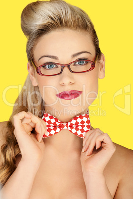 Beautiful blonde in a glasses and a bowtie