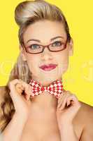 Beautiful blonde in a glasses and a bowtie