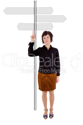Woman pointing at road signs