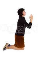 Woman kneeling and praying