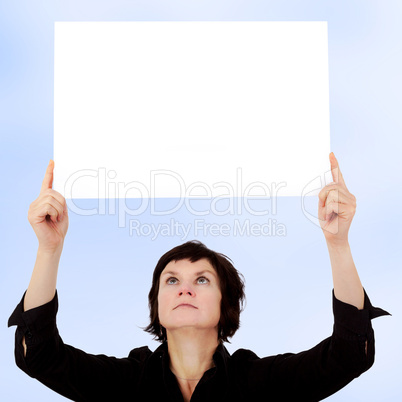 Woman holding up blank poster