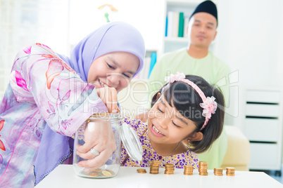 Asian saving money Asian saving money