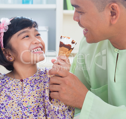 Southeast Asian family eat ice cream