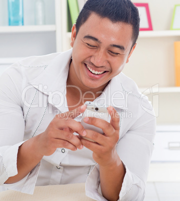 Asian man using smartphone