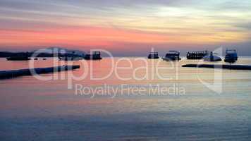 Sunrise at Naama Bay, Red Sea and motor yachts, Sharm el Sheikh,