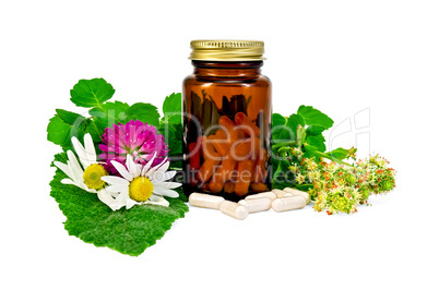 Capsules in a brown sealed jars with herbs