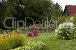 Adirondack chairs in garden