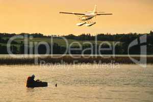 Fisherman and float plane