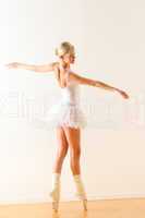 Beautiful ballet dancer dancing in the studio