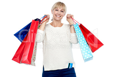 Portrait of a middle aged shopaholic woman