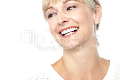 Closeup shot of a beautiful woman smiling heartily