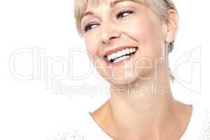 Closeup shot of a beautiful woman smiling heartily