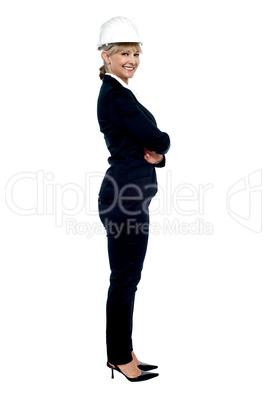 Female business architect posing sideways