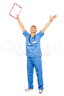 Long shot of a jubilant doctor celebrating her success