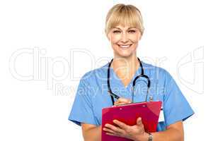 Shot of a cheerful doctor doing her rounds