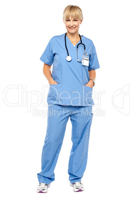 Cheerful relaxed female doctor in uniform