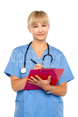 Charming female doctor looking composed