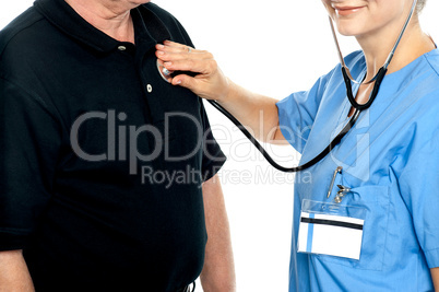Cropped image of doctor examining a patient
