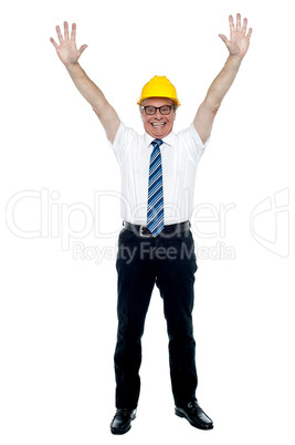 Contemporary construction engineer celebrating his success