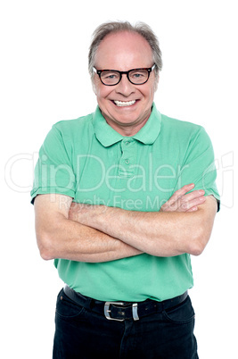 Studio shot of a cheerful elderly man