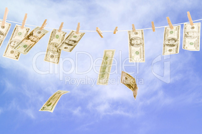 U.S. Currency hanging on clotheslin