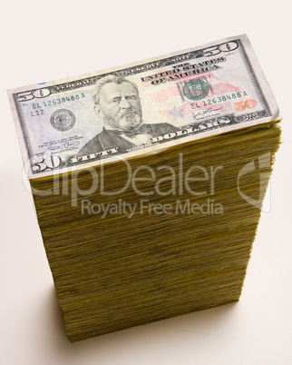 Cash stack of 50 dollar bills