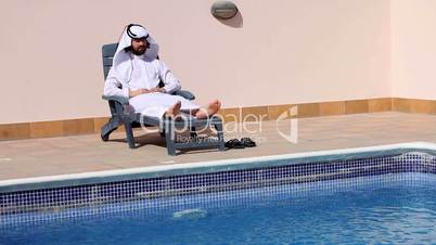 Saudi arabian at swimming pool