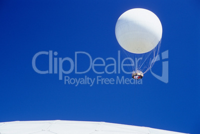 White balloon over white dome