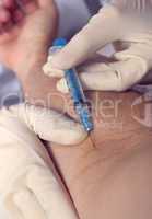 Stock Photograph Of Syringe Held By