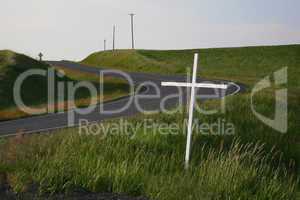 White cross marks highway fatality
