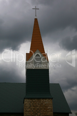 Church steeple and stormy sky