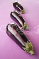 three eggplants