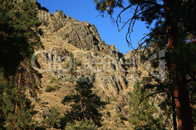Steep rocky mountain cliffs