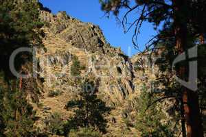 Steep rocky mountain cliffs