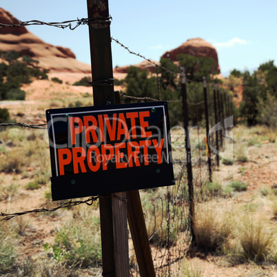 Private property sign on fence