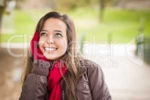 Pretty Woman Portrait Wearing Red Scarf and Mittens Outside