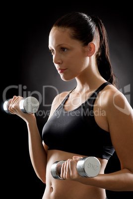 Sport fitness woman young weights exercise