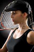 Young tennis player woman with racket