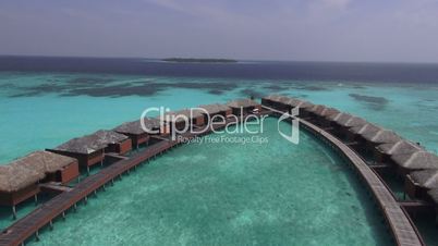 flying over water bungalows