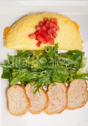 cheese ometette with tomato and salad