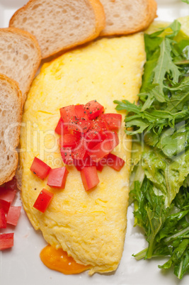 cheese ometette with tomato and salad